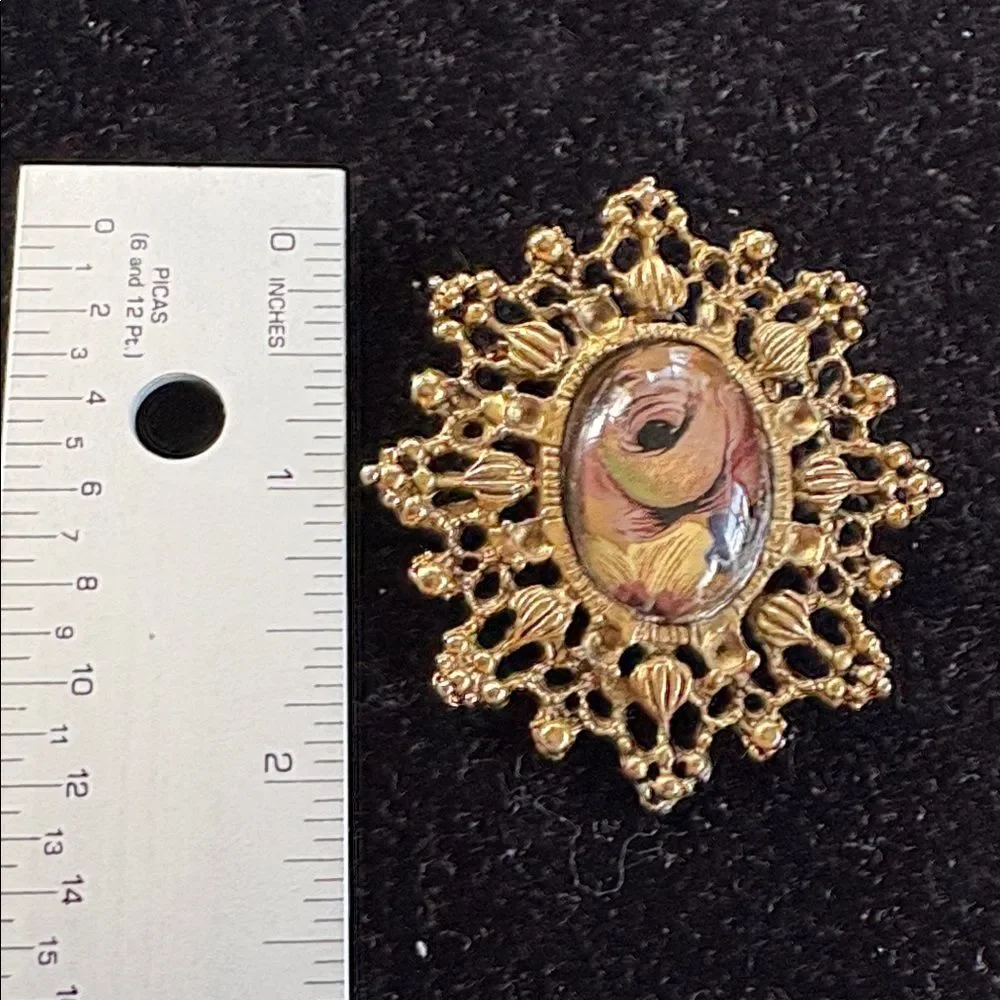 Elegant Scroll Brooch with Rose